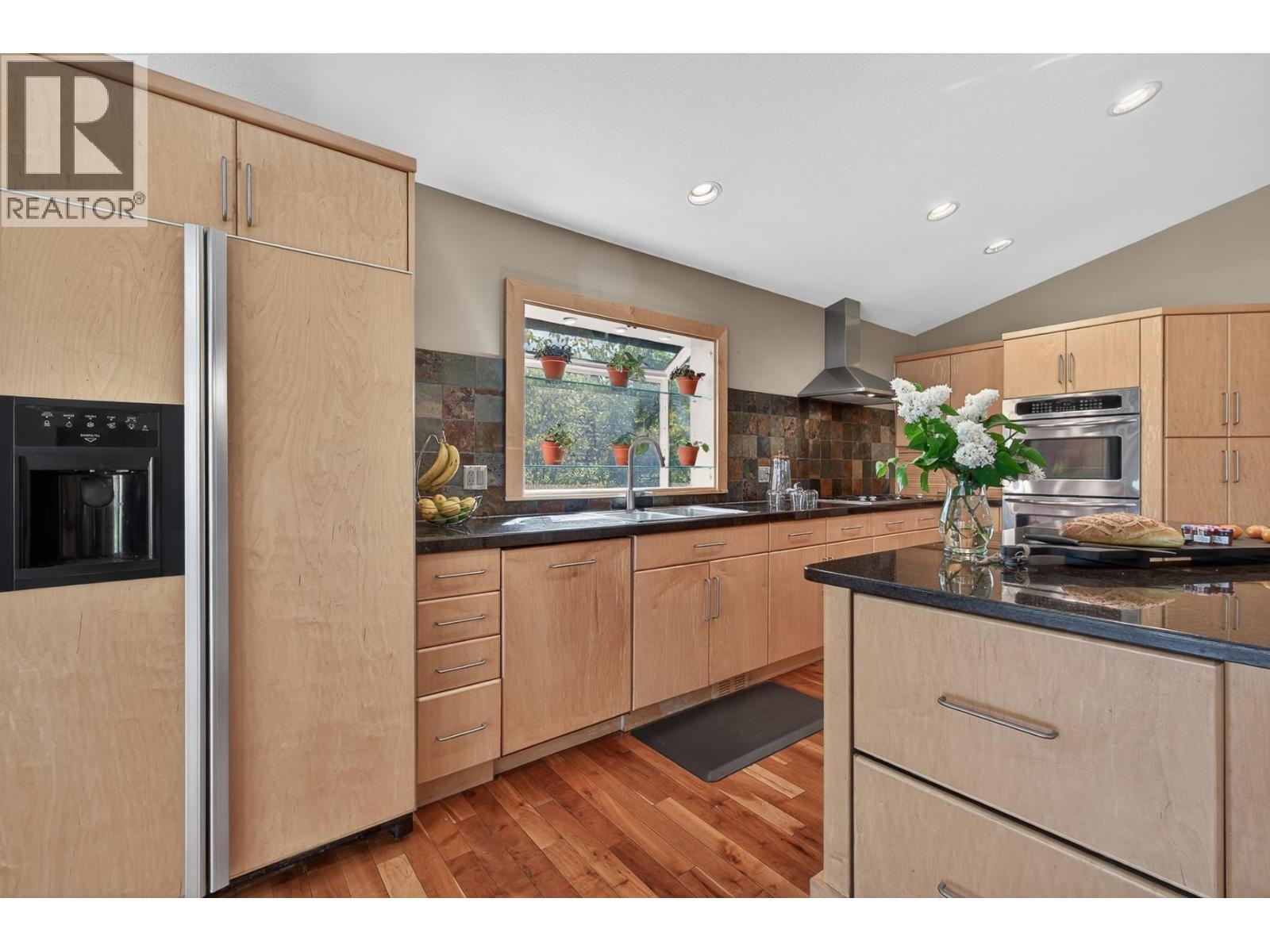 3929 Gallaghers Circle, Kelowna, BC - Indoor Photo Showing Kitchen With Double Sink