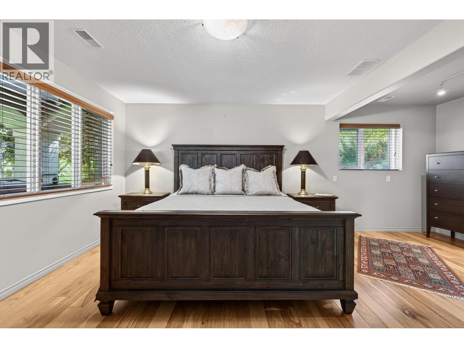 3929 Gallaghers Circle, Kelowna, BC - Indoor Photo Showing Bedroom