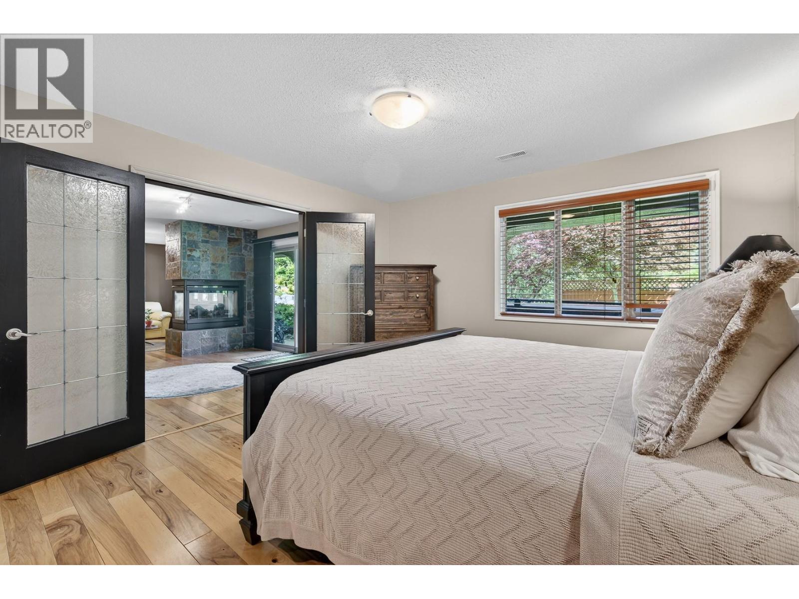 3929 Gallaghers Circle, Kelowna, BC - Indoor Photo Showing Bedroom