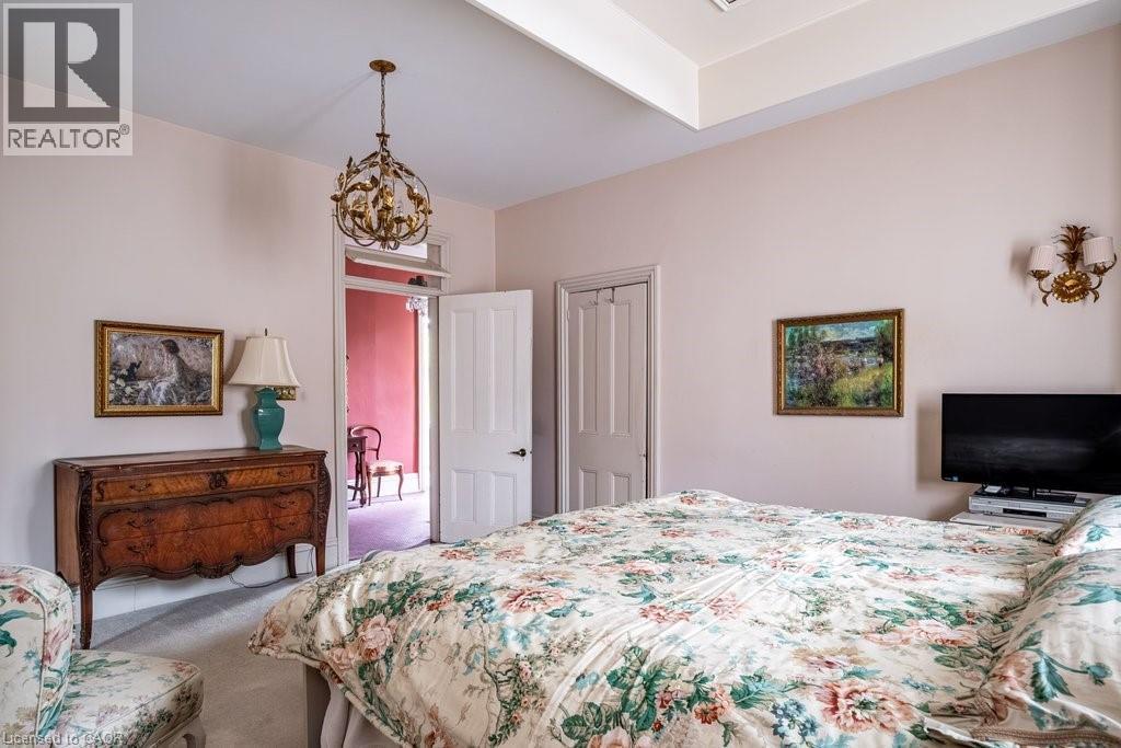 Recessed ceiling detail and wall-mounted sconces - 370 Hess Street S, Hamilton, ON - Indoor Photo Showing Bedroom