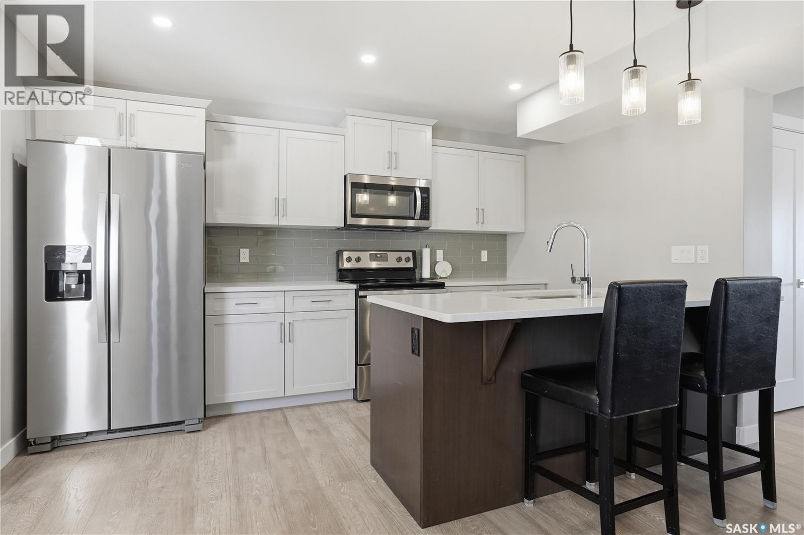 4521 E Keller Avenue, Regina, SK - Indoor Photo Showing Kitchen With Stainless Steel Kitchen With Upgraded Kitchen