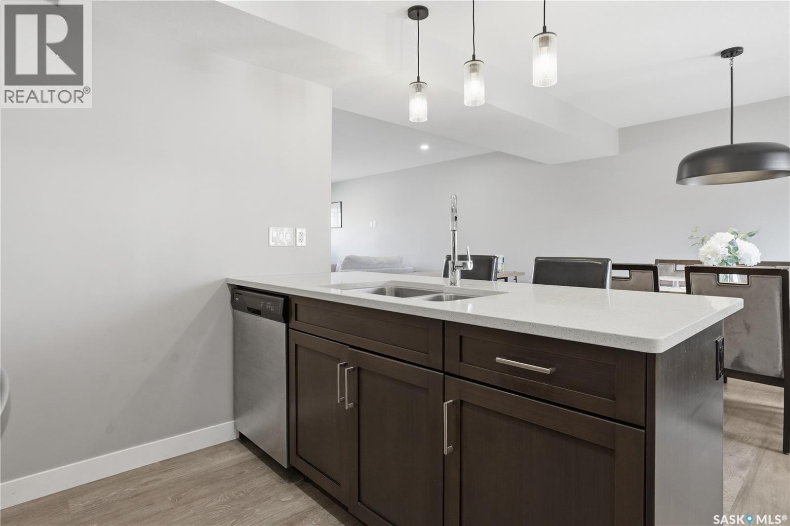 4521 E Keller Avenue, Regina, SK - Indoor Photo Showing Kitchen With Double Sink