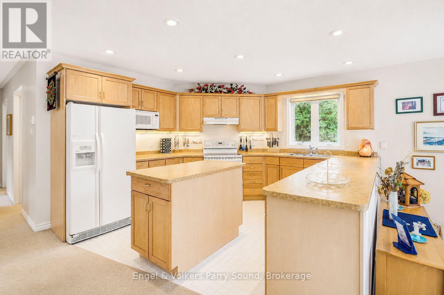 1 Loon Bay, Carling, ON - Indoor Photo Showing Kitchen With Double Sink