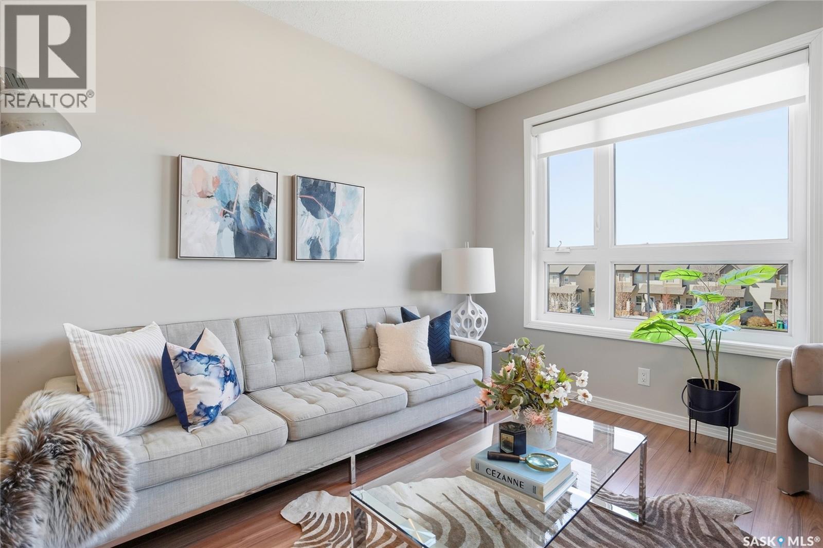 212 235 Evergreen Square, Saskatoon, SK - Indoor Photo Showing Living Room