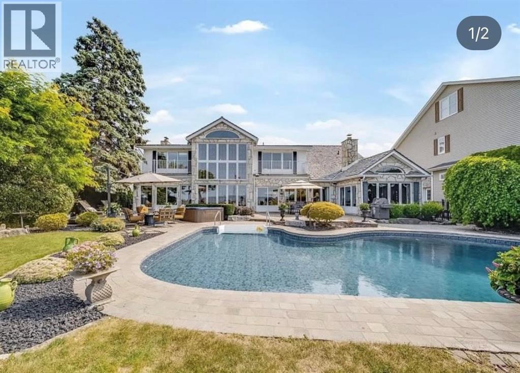 13018 Riverside Drive, Tecumseh, ON - Outdoor With In Ground Pool
