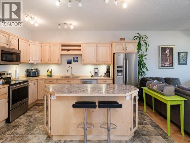 137 Olive May Way, Whitehorse, YT - Indoor Photo Showing Kitchen With Stainless Steel Kitchen