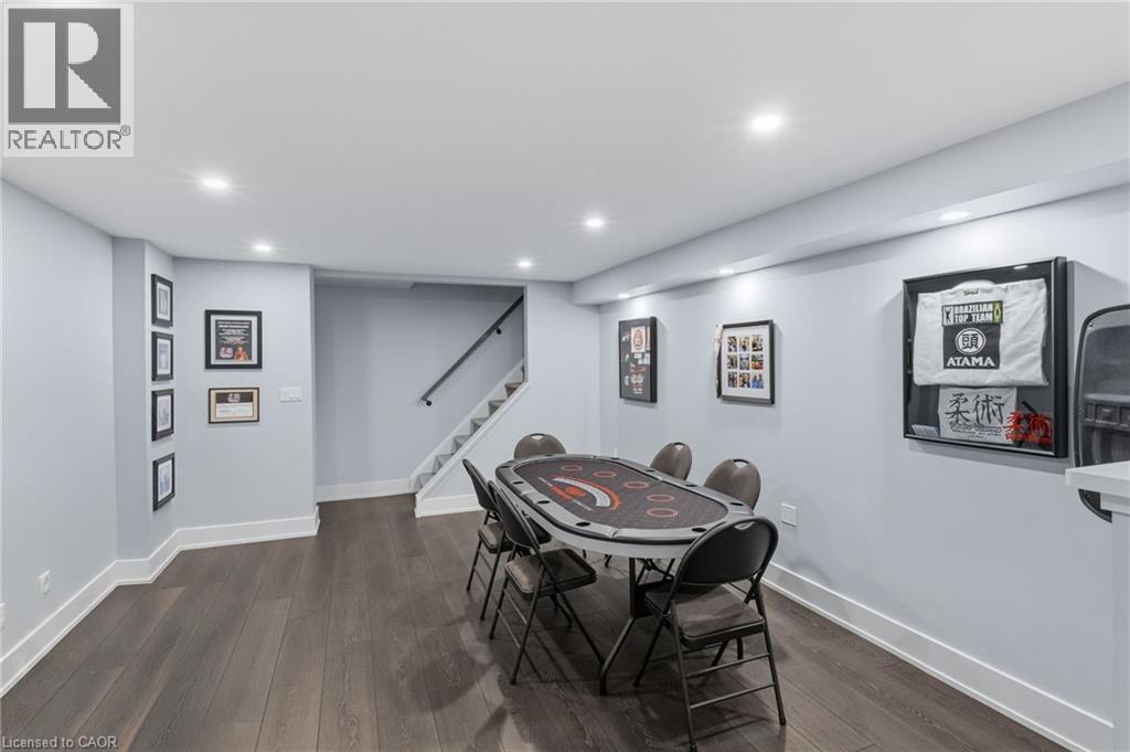 Finished lower level featuring recessed lighting and wood-finish flooring - 2116 Binbrook Road E, Hamilton, ON - Indoor