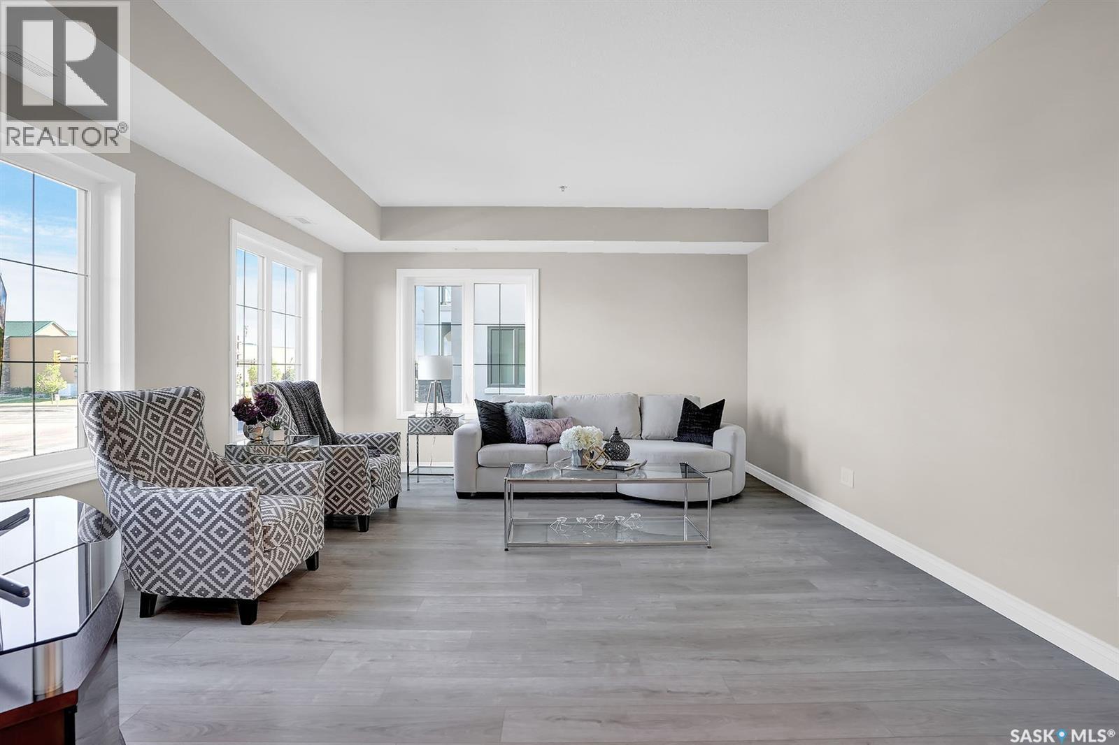 401 4594 Harbour Landing Drive, Regina, SK - Indoor Photo Showing Living Room