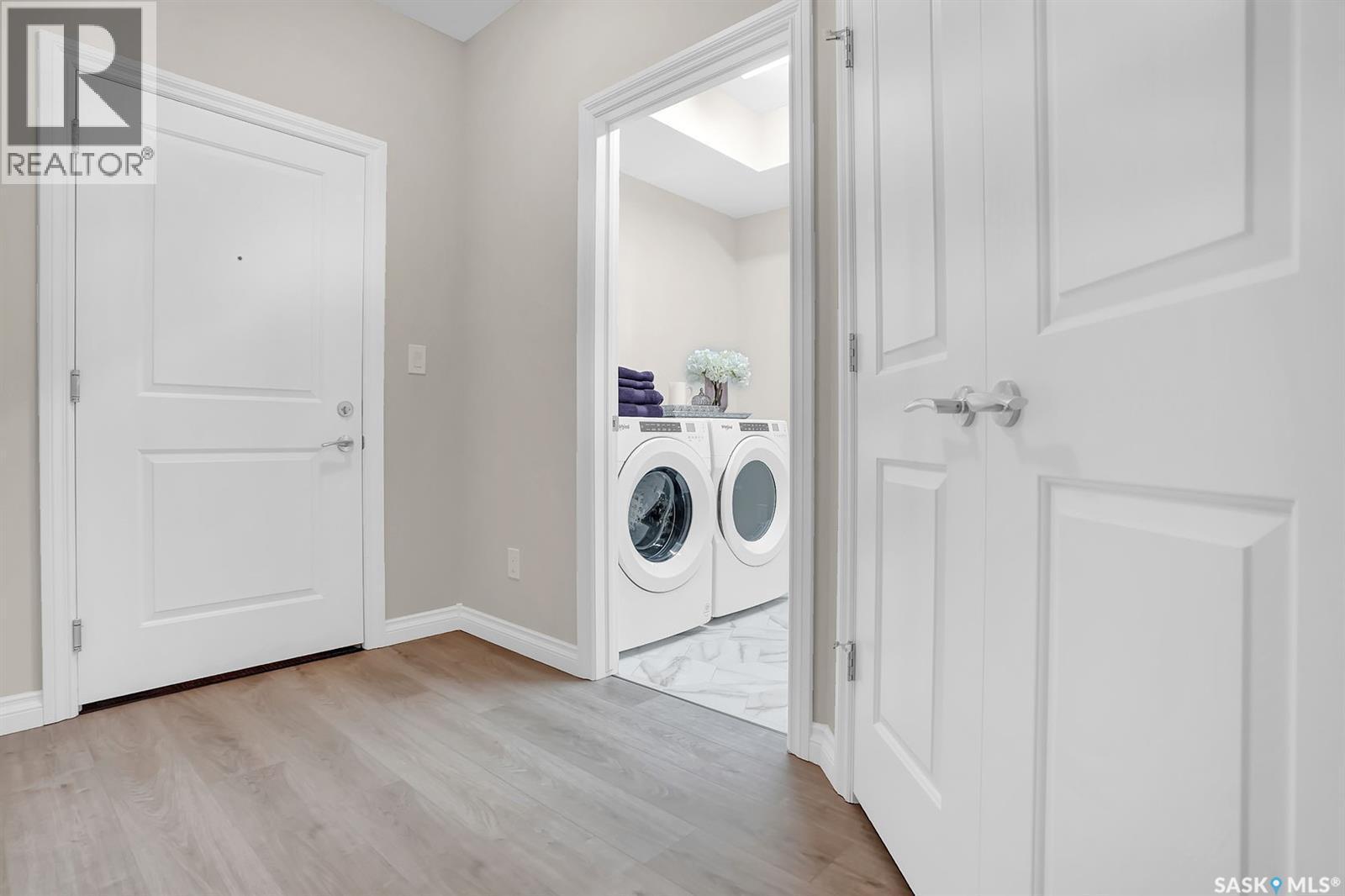 401 4594 Harbour Landing Drive, Regina, SK - Indoor Photo Showing Laundry Room