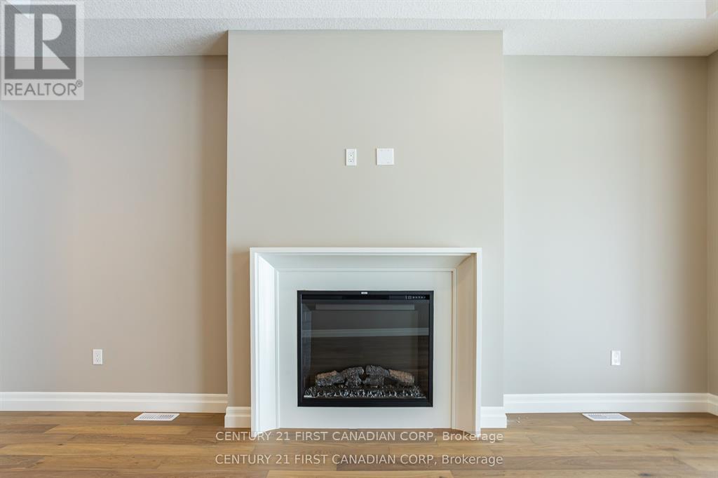 Lot 105 Darwin Crescent, London South (South V), ON - Indoor With Fireplace