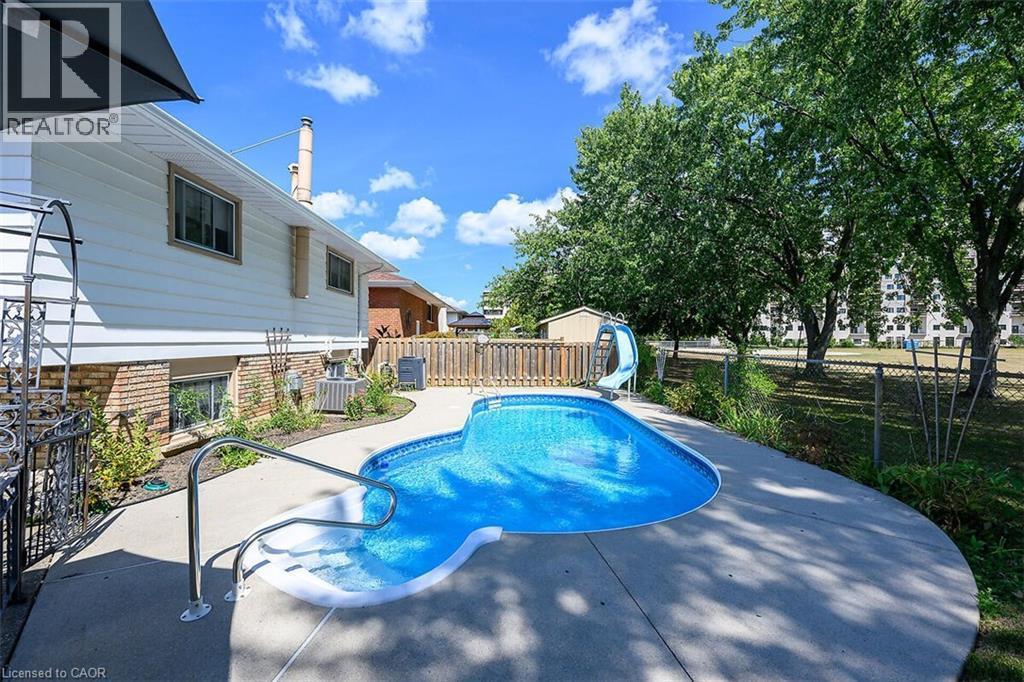 24 Oxford Street, Brantford, ON - Outdoor With In Ground Pool