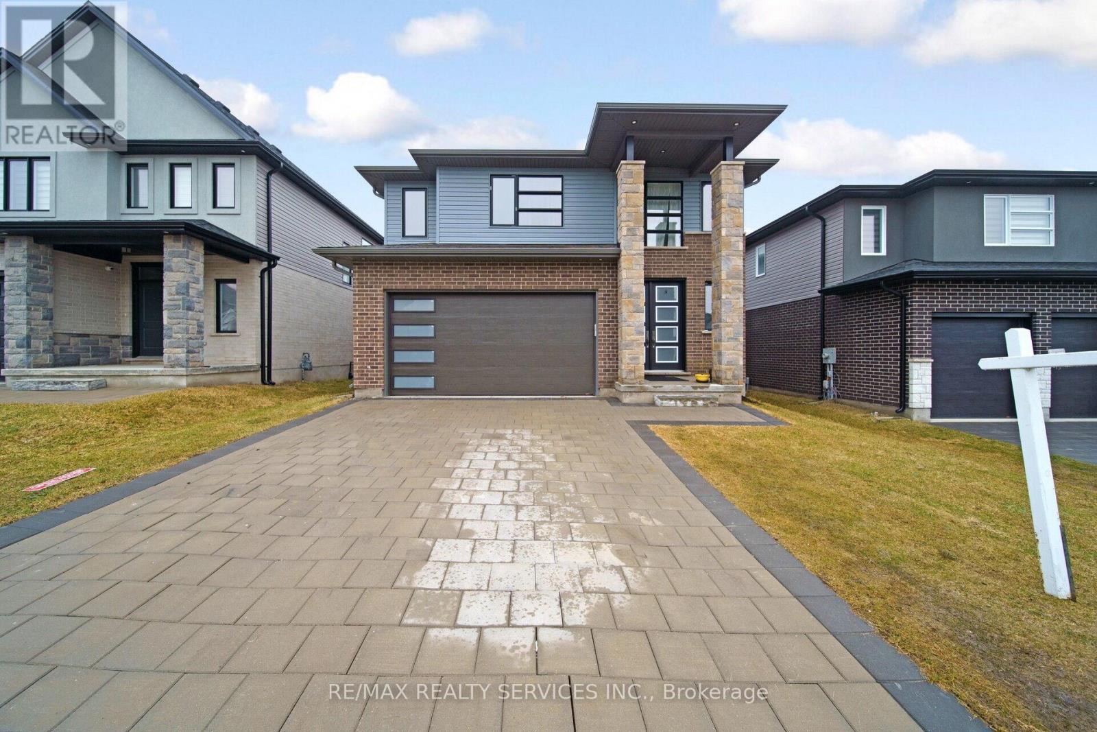 1891 Fountain Grass Drive, London South, ON - Outdoor With Facade