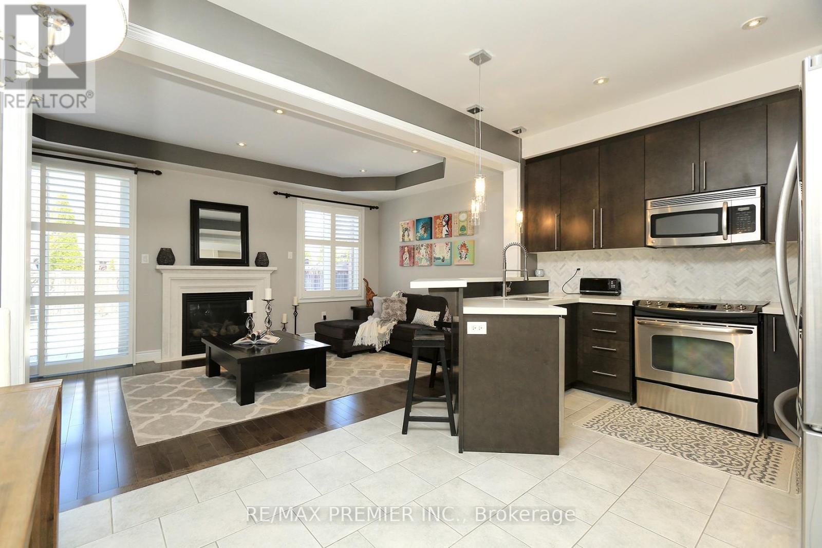 79 Hansard Drive, Vaughan, ON - Indoor Photo Showing Kitchen With Fireplace With Stainless Steel Kitchen