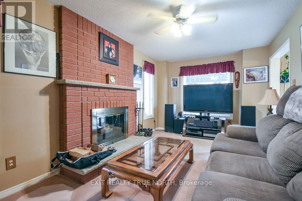 53 Etherington Crescent, Barrie, ON - Indoor Photo Showing Living Room With Fireplace
