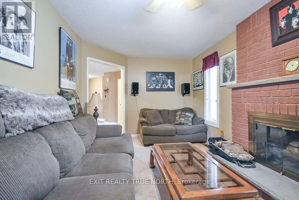 53 Etherington Crescent, Barrie, ON - Indoor Photo Showing Living Room With Fireplace
