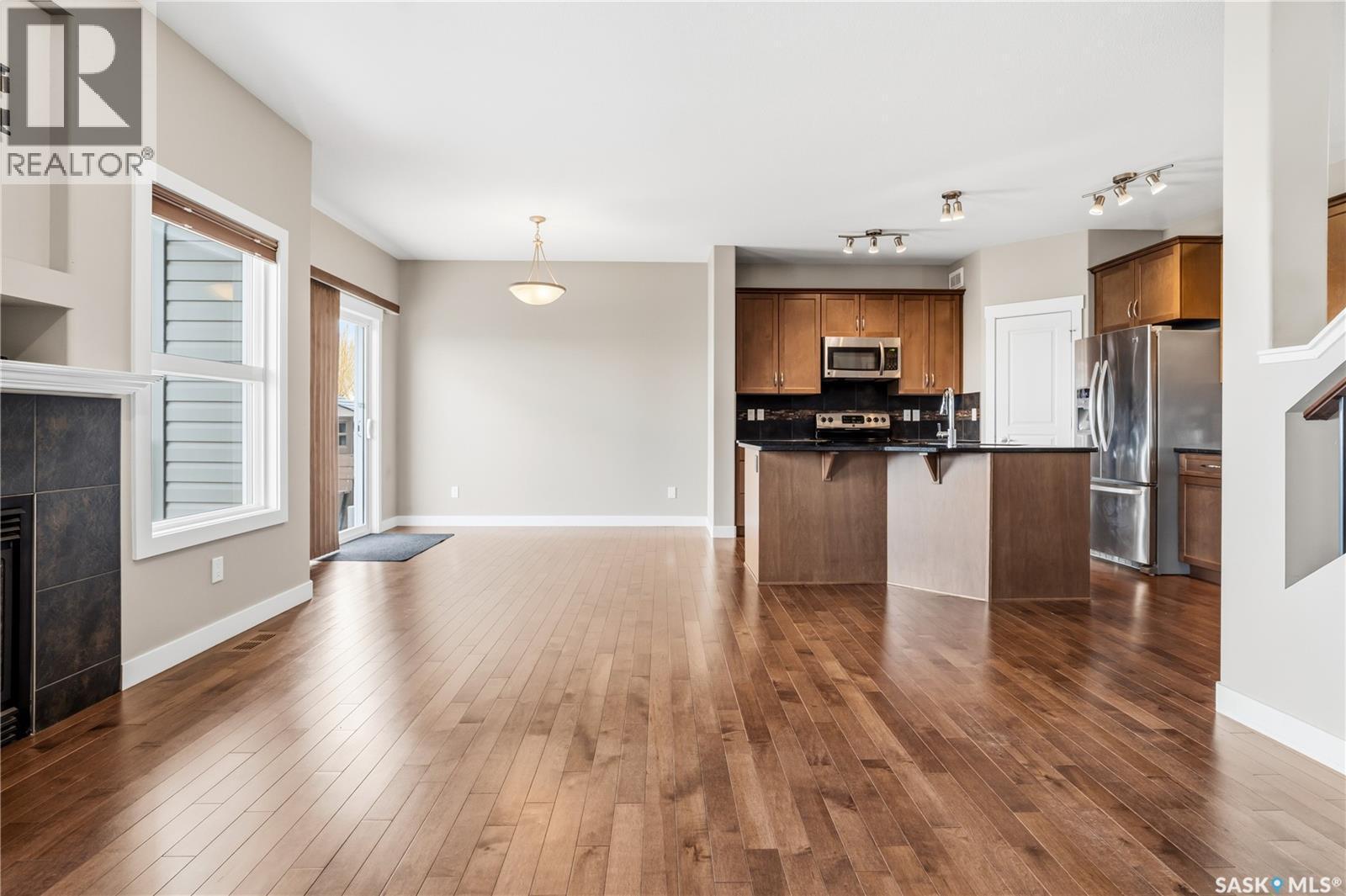 8814 Herman Crescent, Regina, SK - Indoor Photo Showing Kitchen With Fireplace