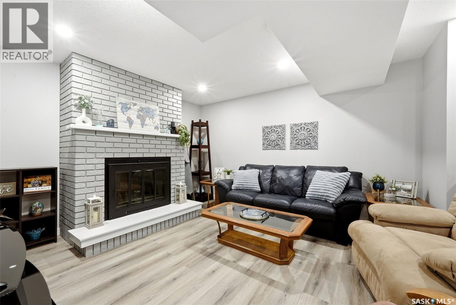 68 Carmichael Road, Regina, SK - Indoor Photo Showing Living Room With Fireplace