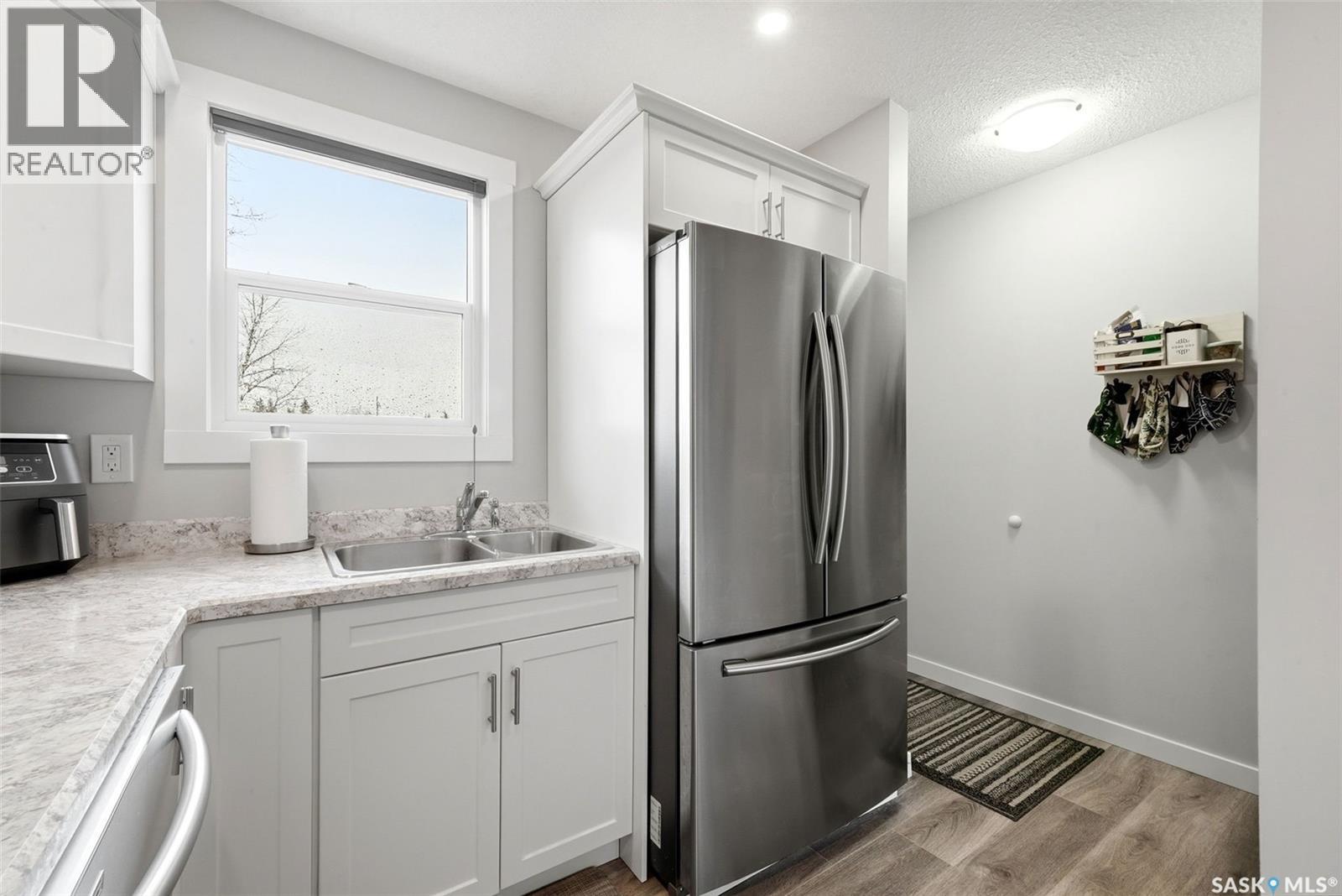68 Carmichael Road, Regina, SK - Indoor Photo Showing Kitchen With Double Sink