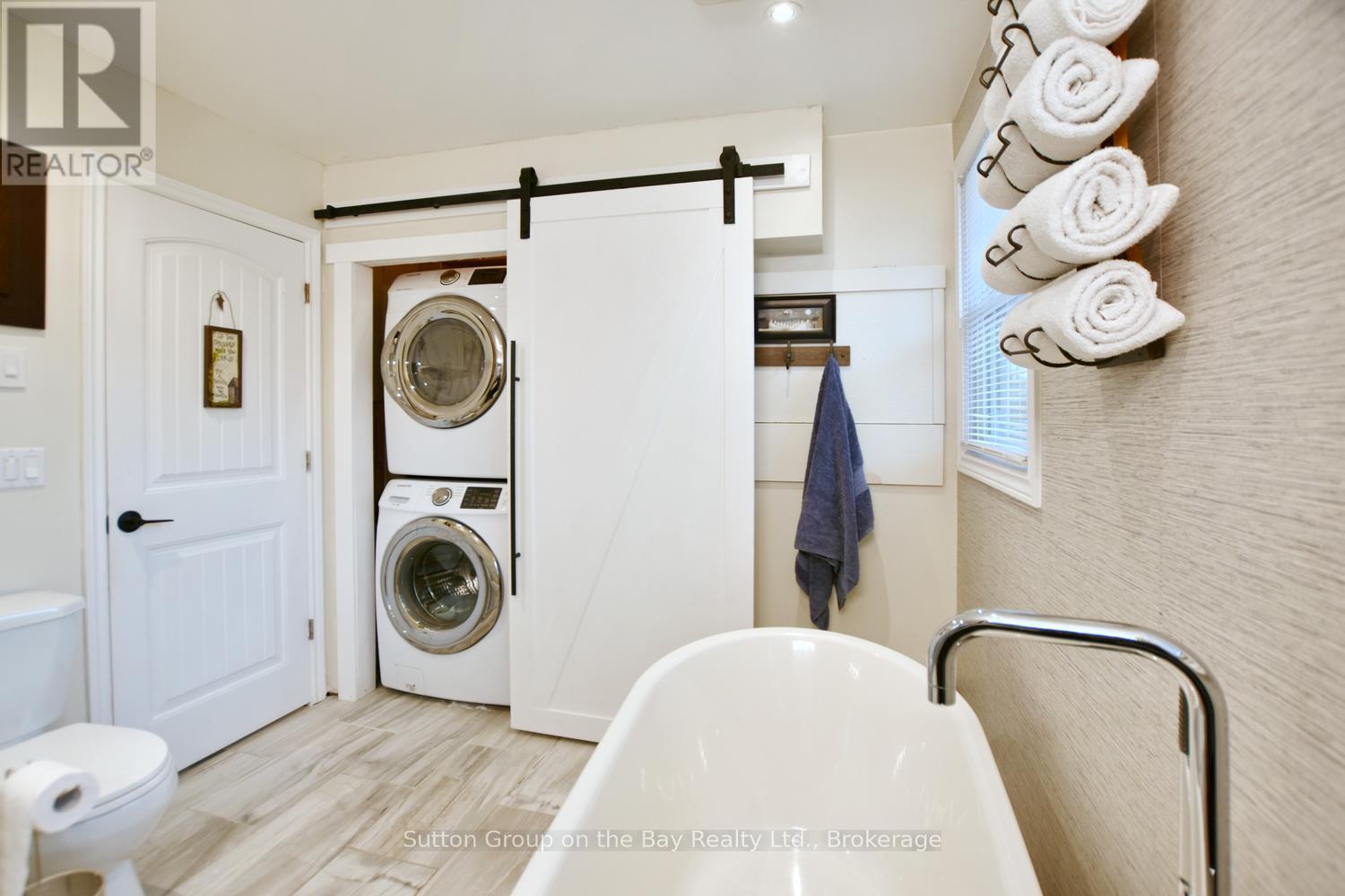 Hide-a-way washer & Dryer - 238 Mccrea Drive, Clearview (Stayner), ON - Indoor Photo Showing Laundry Room