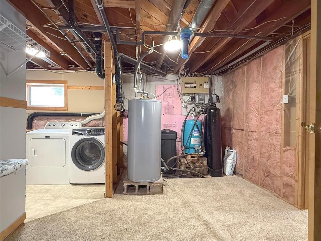 49084 Service Road, Brandon, MB - Indoor Photo Showing Laundry Room