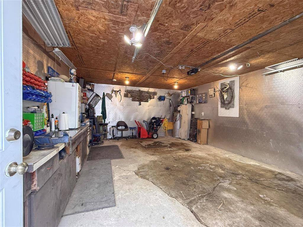 49084 Service Road, Brandon, MB - Indoor Photo Showing Garage