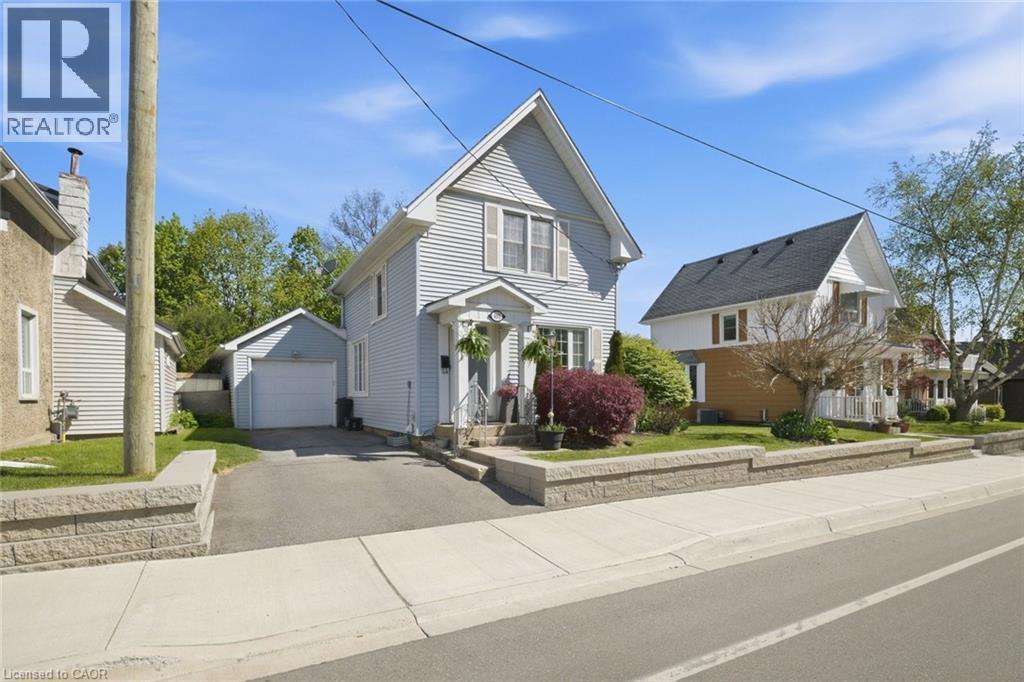 Light blue siding exterior with white trim - 401 West Street, Simcoe, ON - Outdoor With Facade