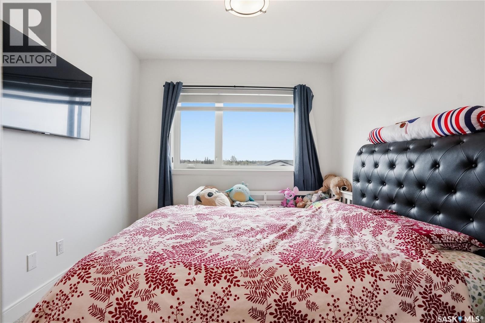 309 105 Willis Crescent, Saskatoon, SK - Indoor Photo Showing Bedroom