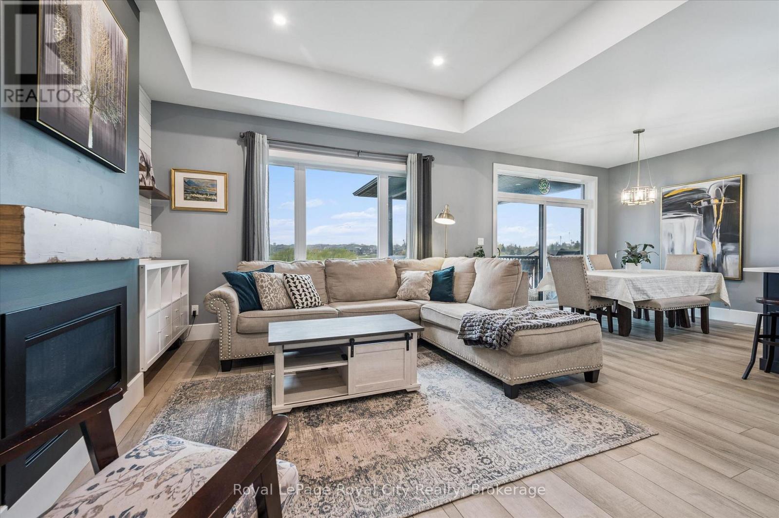 50 Faith Drive, Mapleton, ON - Indoor Photo Showing Living Room With Fireplace