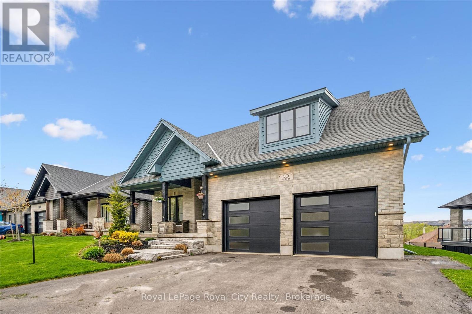 50 Faith Drive, Mapleton, ON - Outdoor With Facade