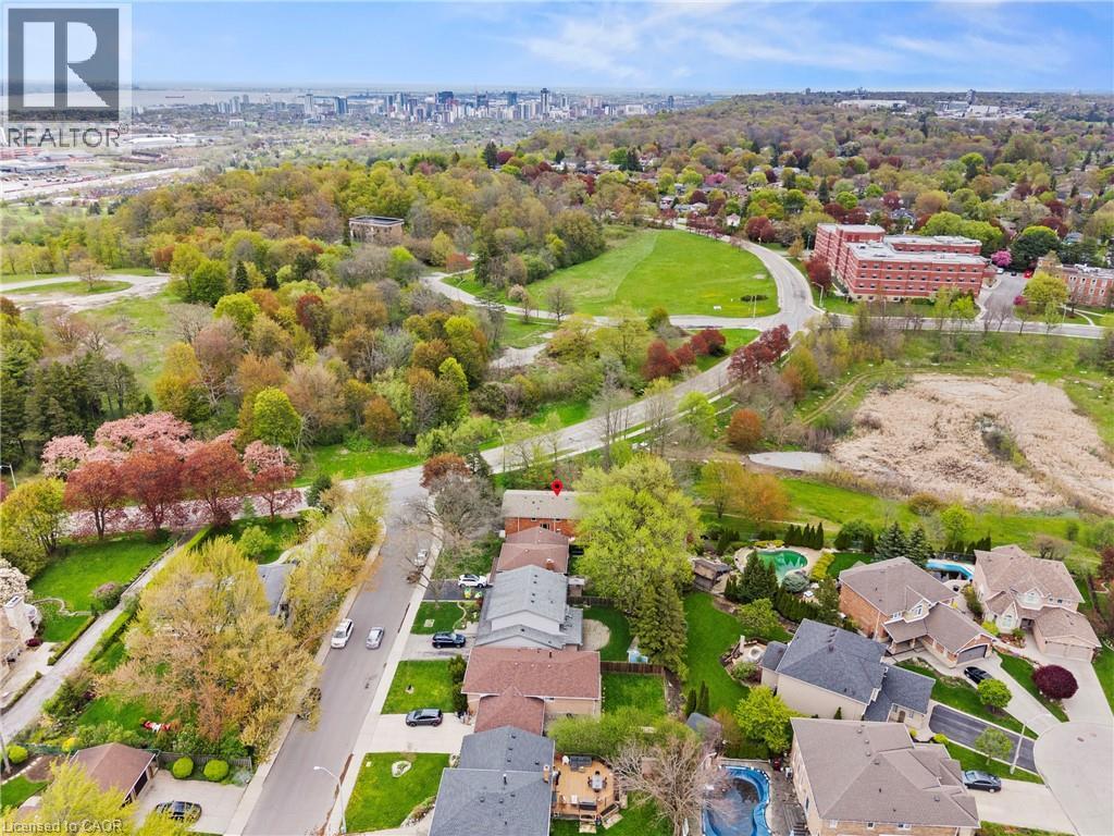 Aerial perspective showcasing residential properties and extensive green spaces - 3 San Pedro Drive, Hamilton, ON - Outdoor With View