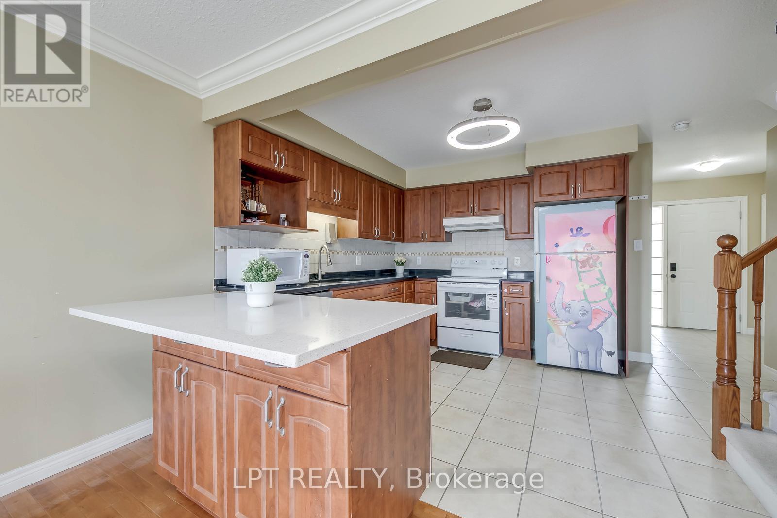 Movable center Island with storage - 6 - 10 Fallowfield Drive, Kitchener, ON - Indoor Photo Showing Kitchen