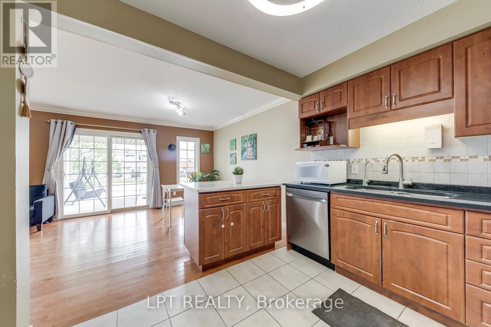 6 - 10 Fallowfield Drive, Kitchener, ON - Indoor Photo Showing Kitchen With Double Sink