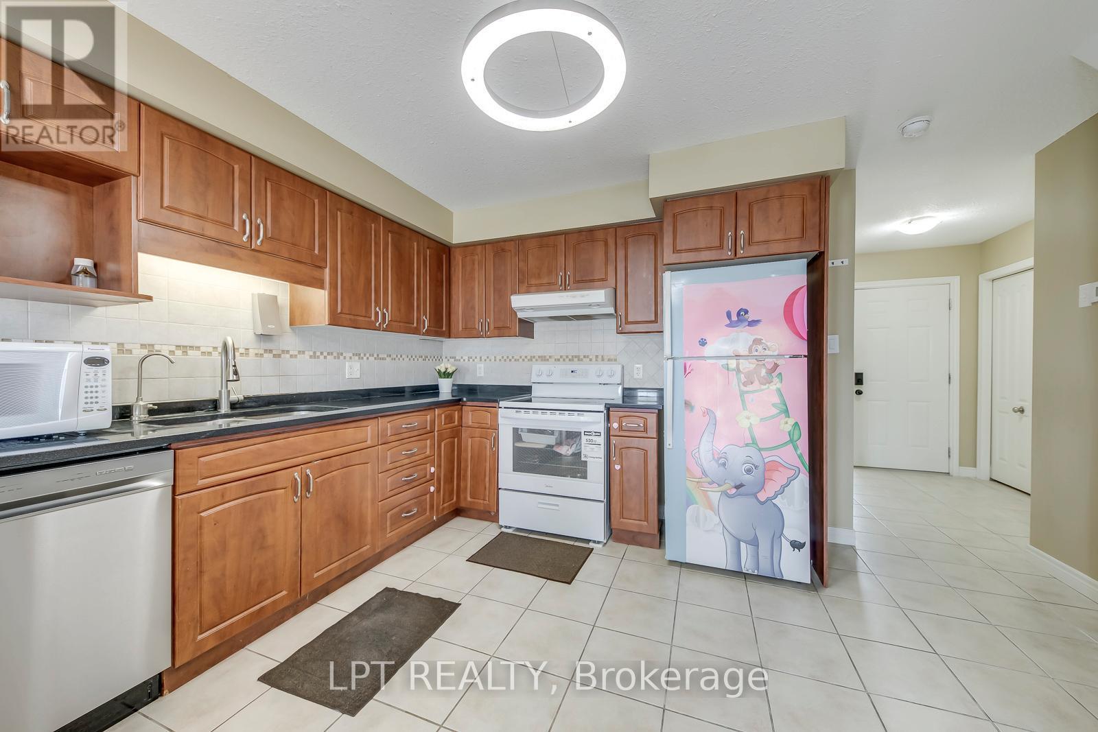6 - 10 Fallowfield Drive, Kitchener, ON - Indoor Photo Showing Kitchen With Double Sink