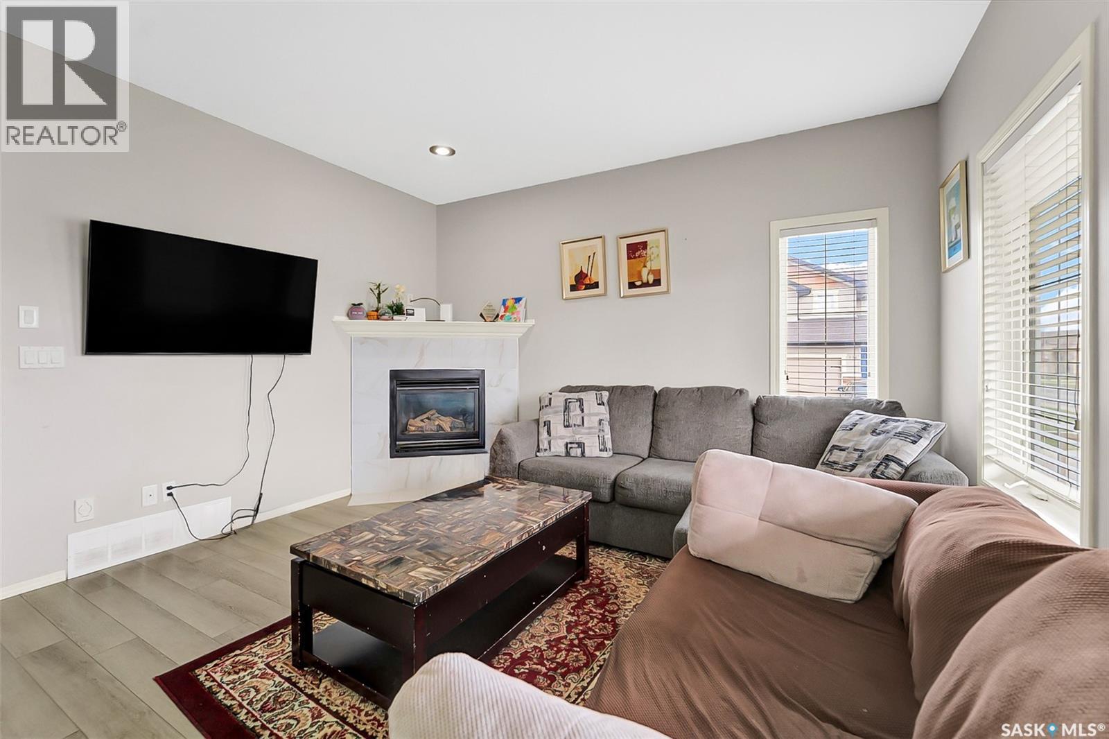 531 Gordon Road, Saskatoon, SK - Indoor Photo Showing Living Room With Fireplace