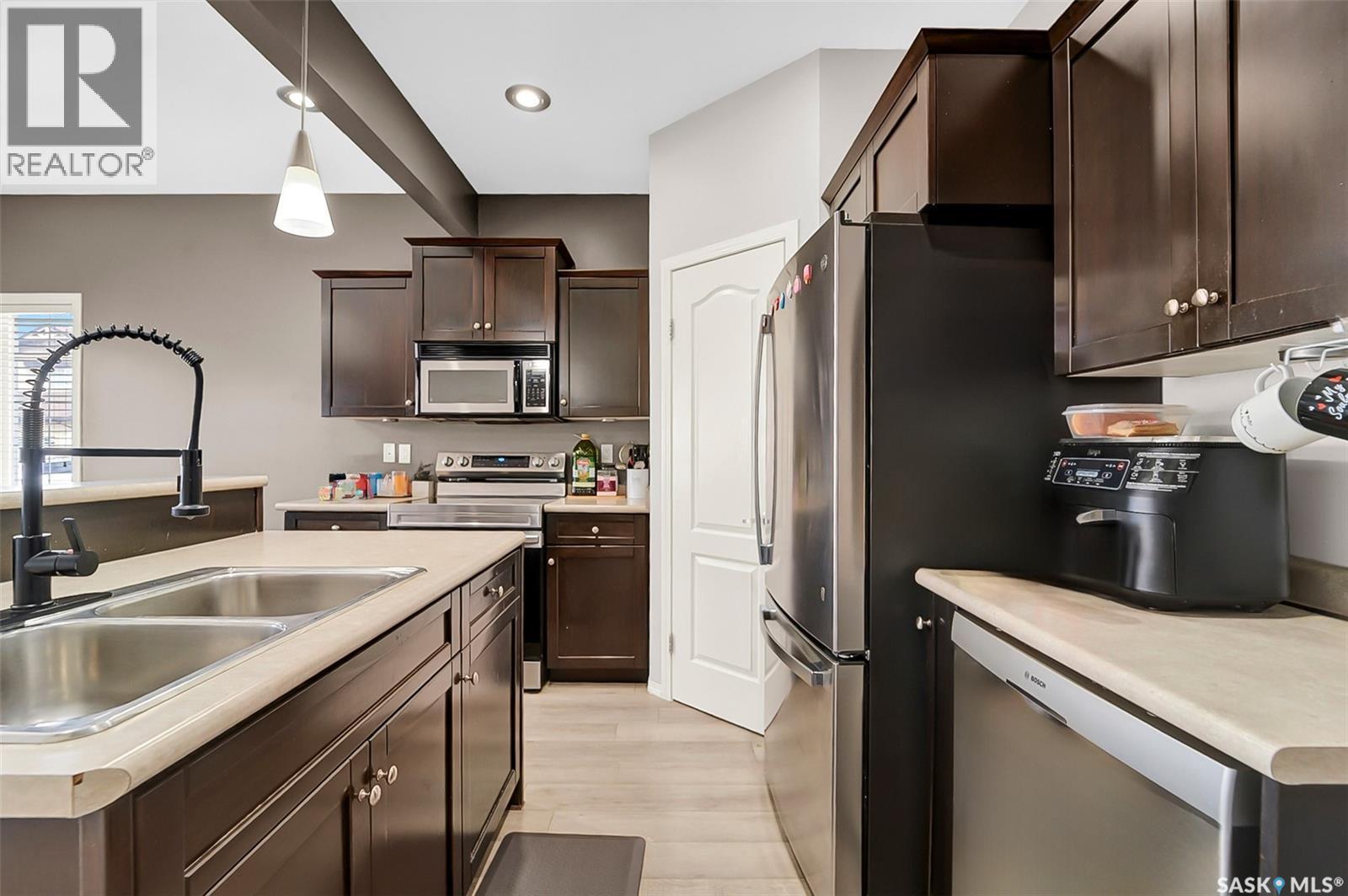 531 Gordon Road, Saskatoon, SK - Indoor Photo Showing Kitchen With Double Sink