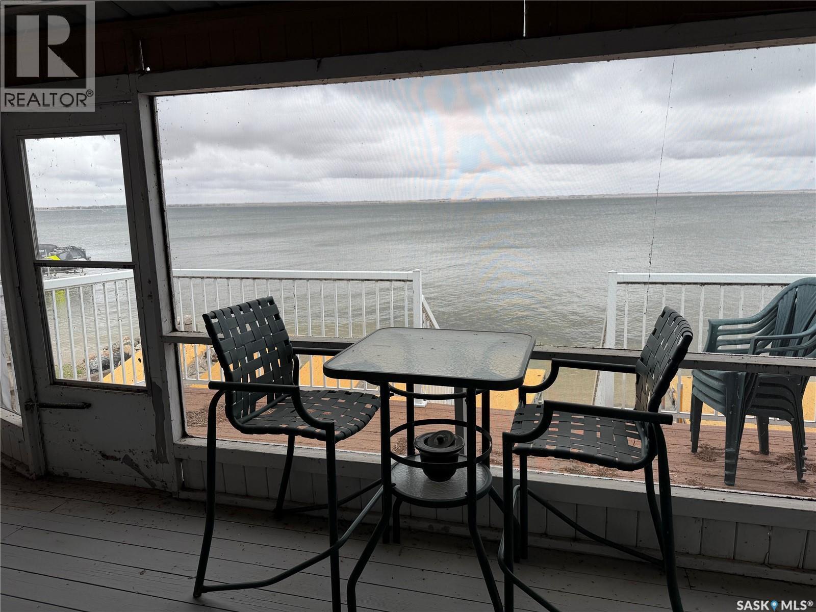 317 Lakeshore Drive, Etters Beach, SK - With Body Of Water With Deck Patio Veranda