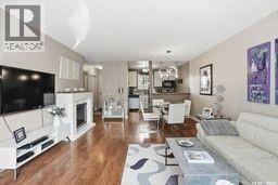 9 Ryan Road, Regina, SK - Indoor Photo Showing Living Room With Fireplace