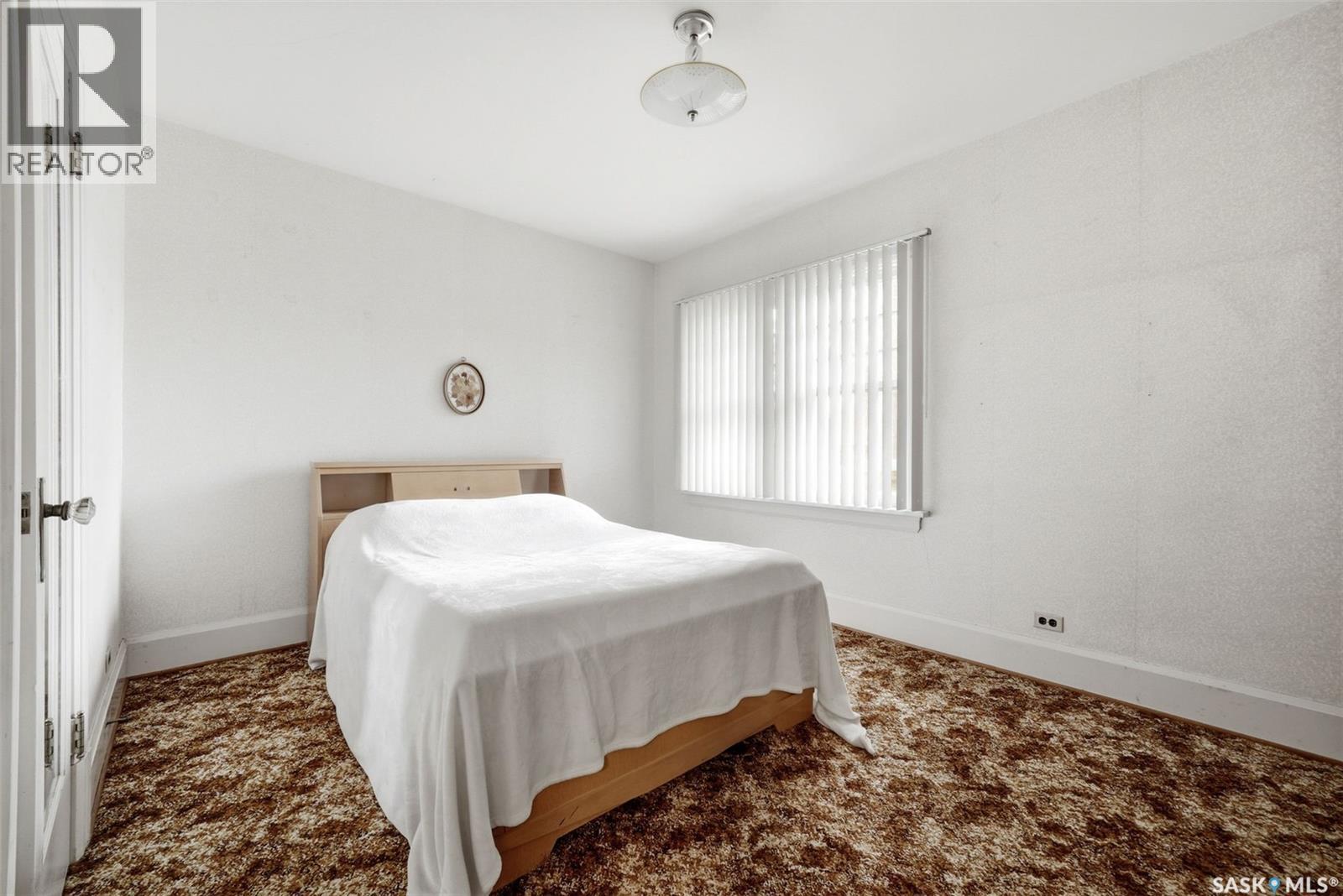 203 Angus Crescent, Regina, SK - Indoor Photo Showing Bedroom