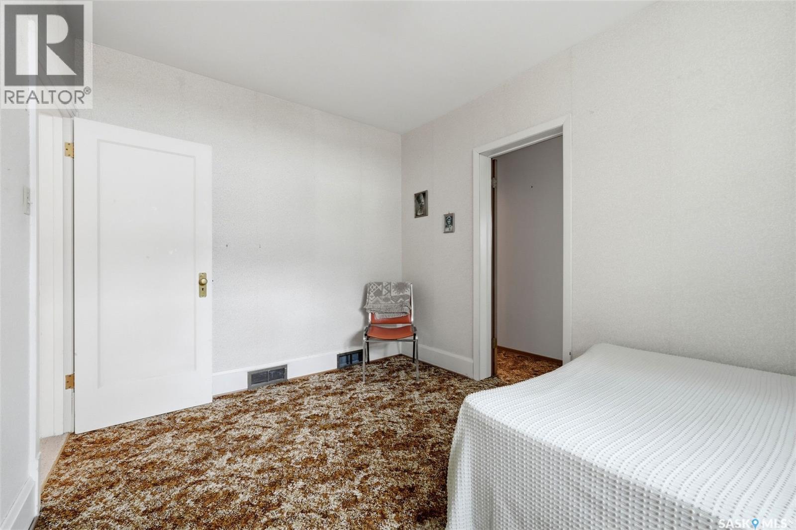 203 Angus Crescent, Regina, SK - Indoor Photo Showing Bedroom