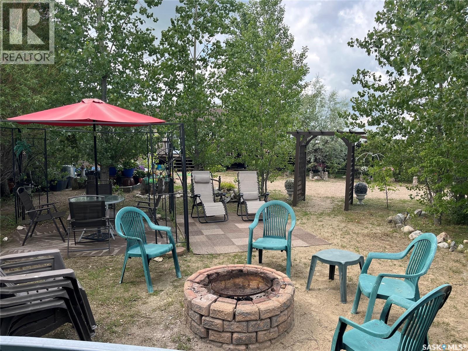 104 Heistad Place, Fishing Lake, SK - Outdoor With Deck Patio Veranda With Backyard