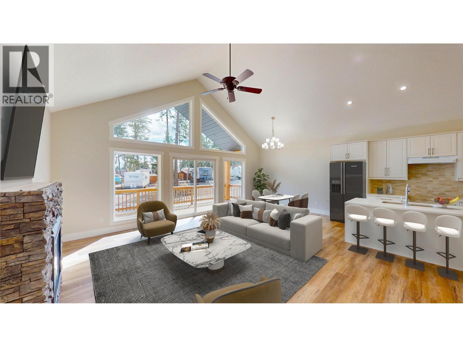 Virtually staged. Please note elements in this photograph including furniture and furnishngs have been virtually staged to demonstrate potential design ideas. - 4868 Riverview Drive Unit# 118, Edgewater, BC - Indoor Photo Showing Living Room