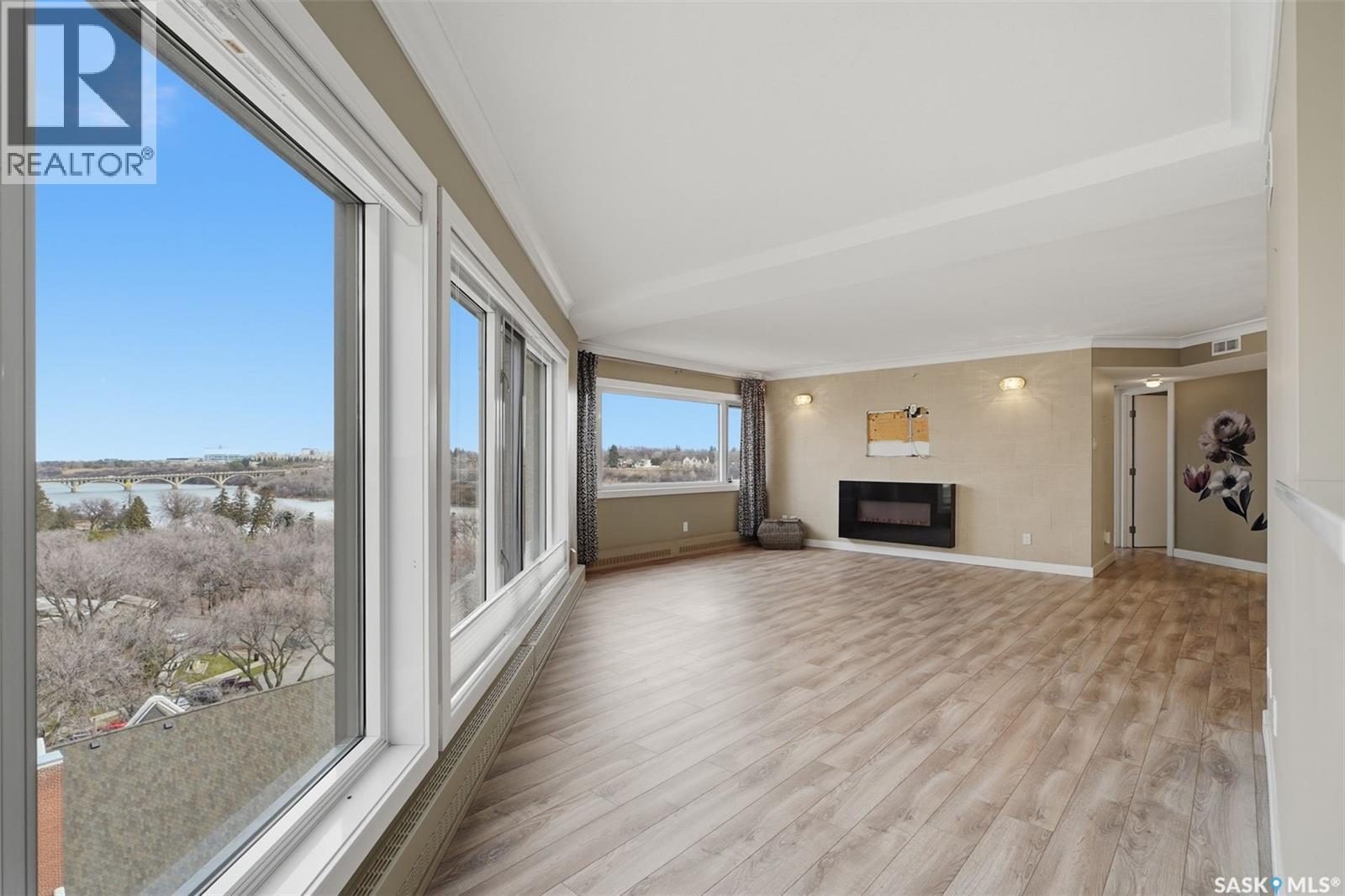 1080 424 Spadina Crescent E, Saskatoon, SK - Indoor Photo Showing Other Room With Fireplace