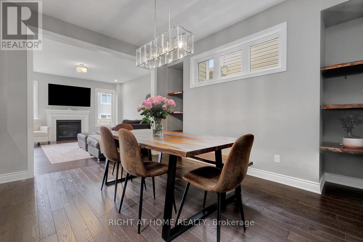 771 Devario Crescent, Ottawa, ON - Indoor Photo Showing Dining Room With Fireplace