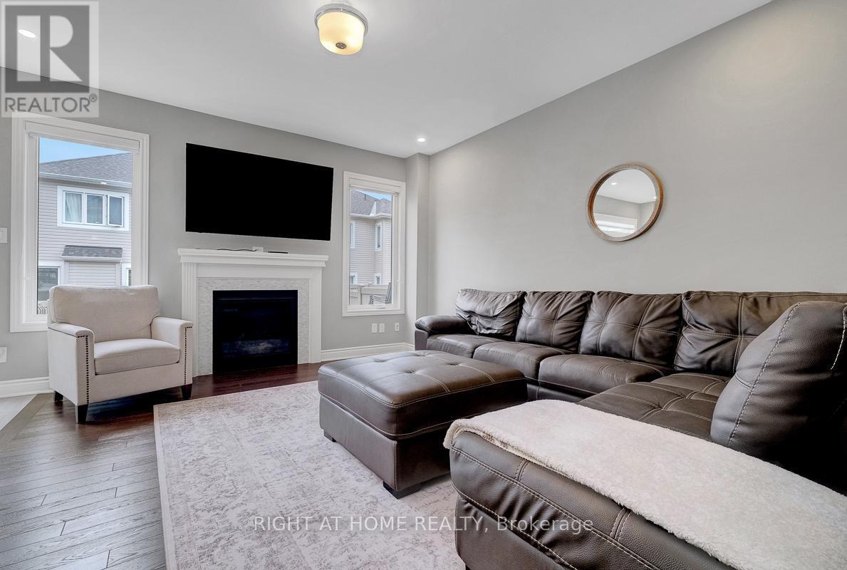 771 Devario Crescent, Ottawa, ON - Indoor Photo Showing Living Room With Fireplace