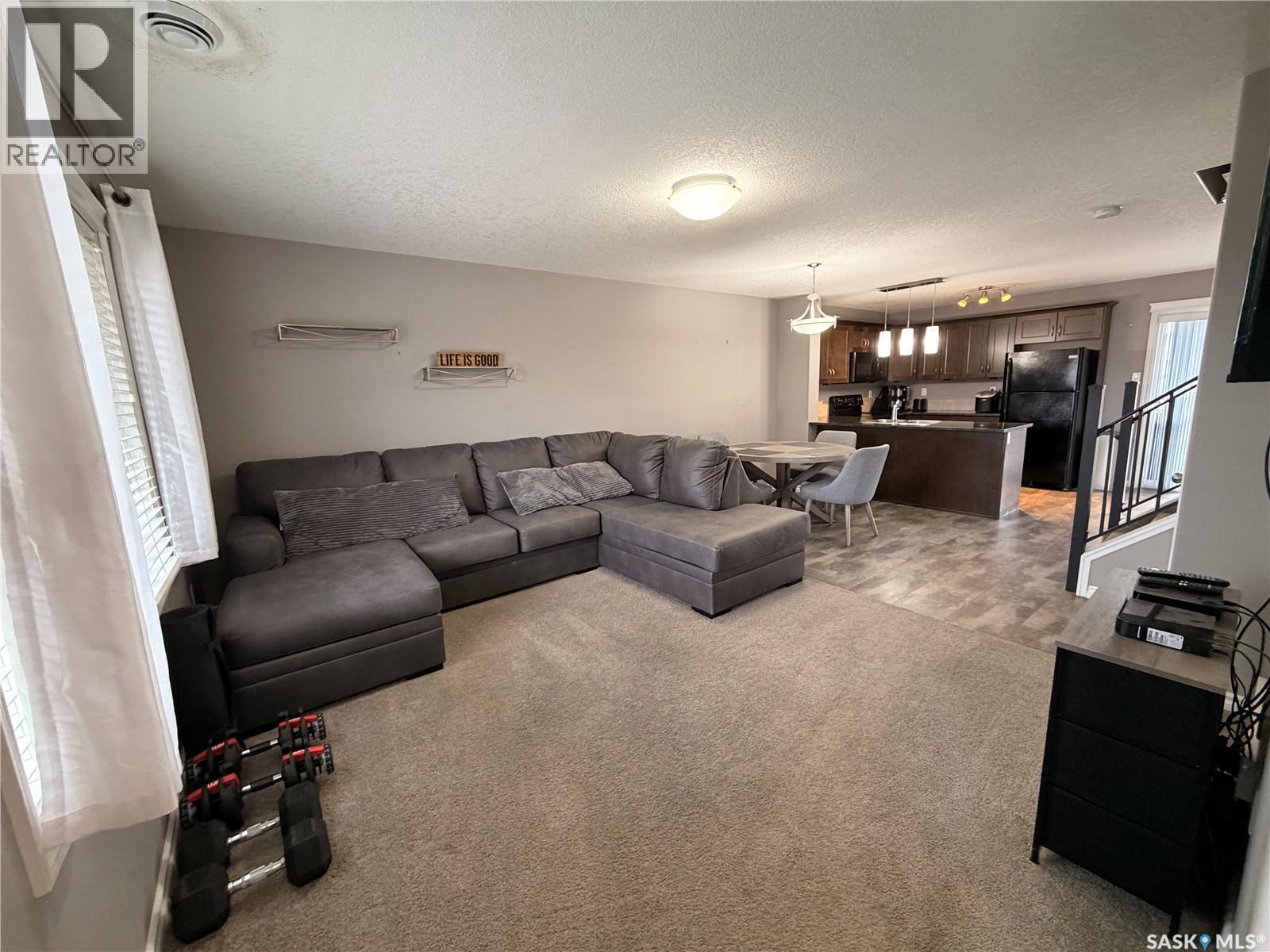 511 210 Rajput Way, Saskatoon, SK - Indoor Photo Showing Living Room