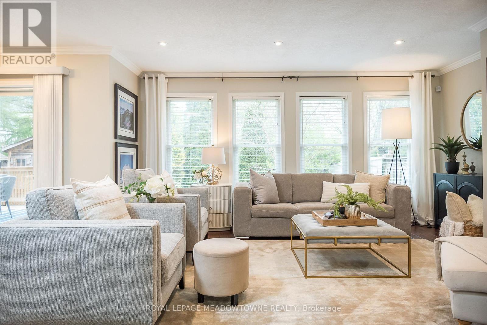 So much natural light! - 23 Baggs Crescent, Cambridge, ON - Indoor Photo Showing Living Room With Fireplace