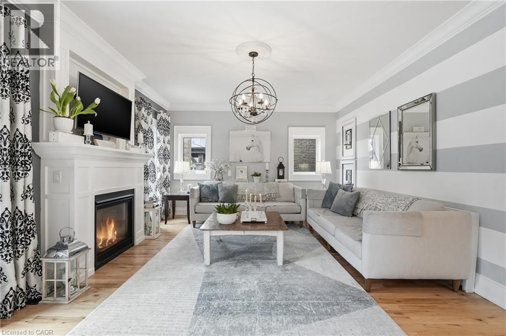 36 Pavilion Drive, Binbrook, ON - Indoor Photo Showing Living Room With Fireplace