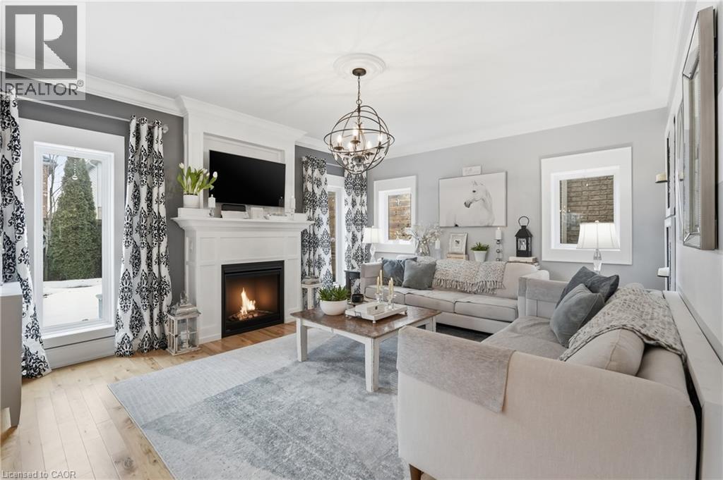 36 Pavilion Drive, Binbrook, ON - Indoor Photo Showing Living Room With Fireplace