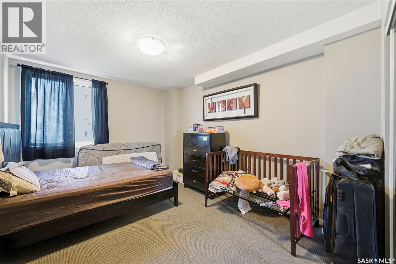 1102 320 5Th Avenue N, Saskatoon, SK - Indoor Photo Showing Bedroom