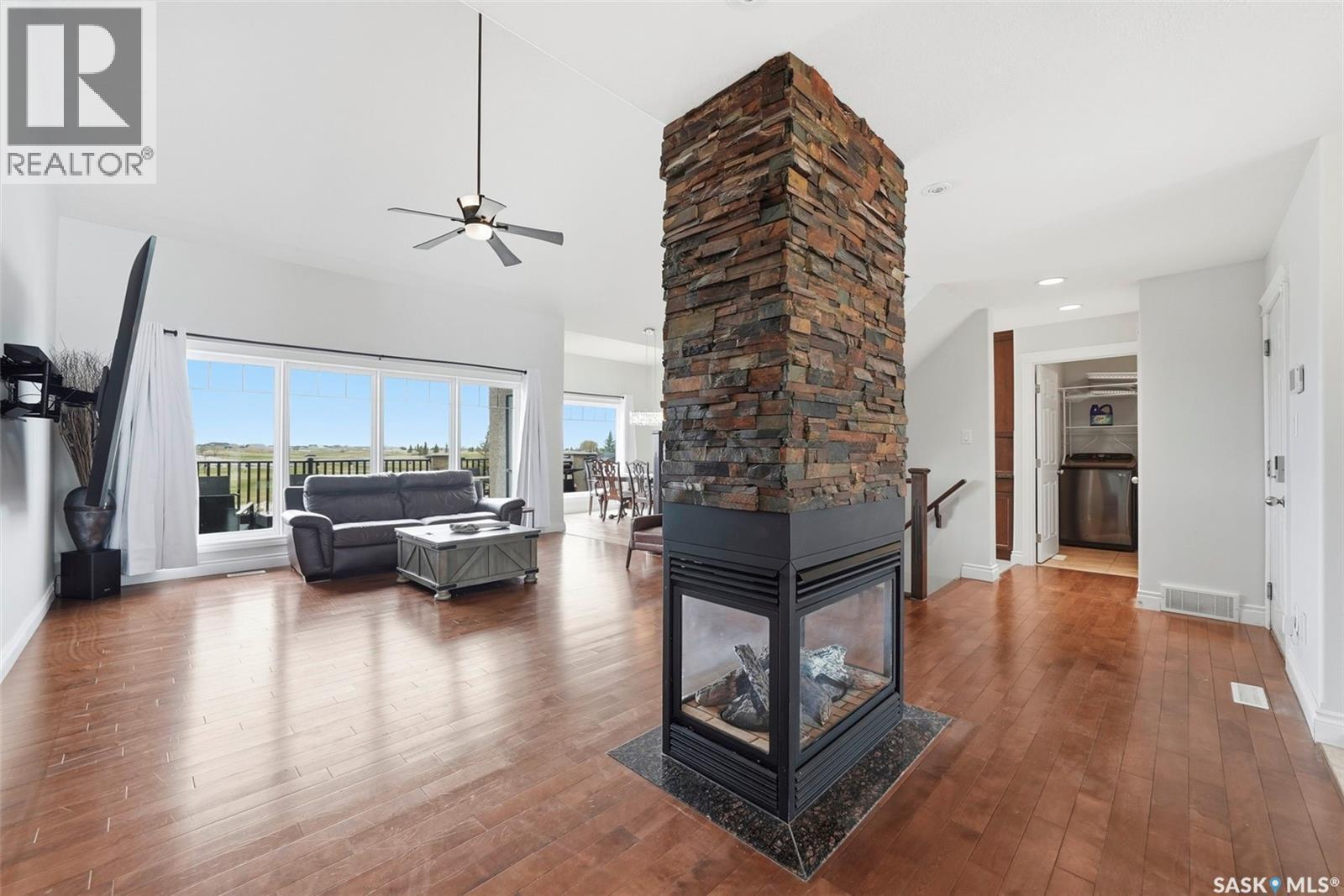 418 Nicklaus Drive, Warman, SK - Indoor Photo Showing Living Room With Fireplace